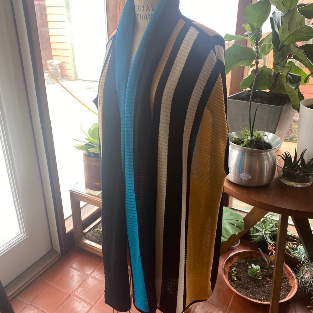 Misook cape/shawl with arm holes.